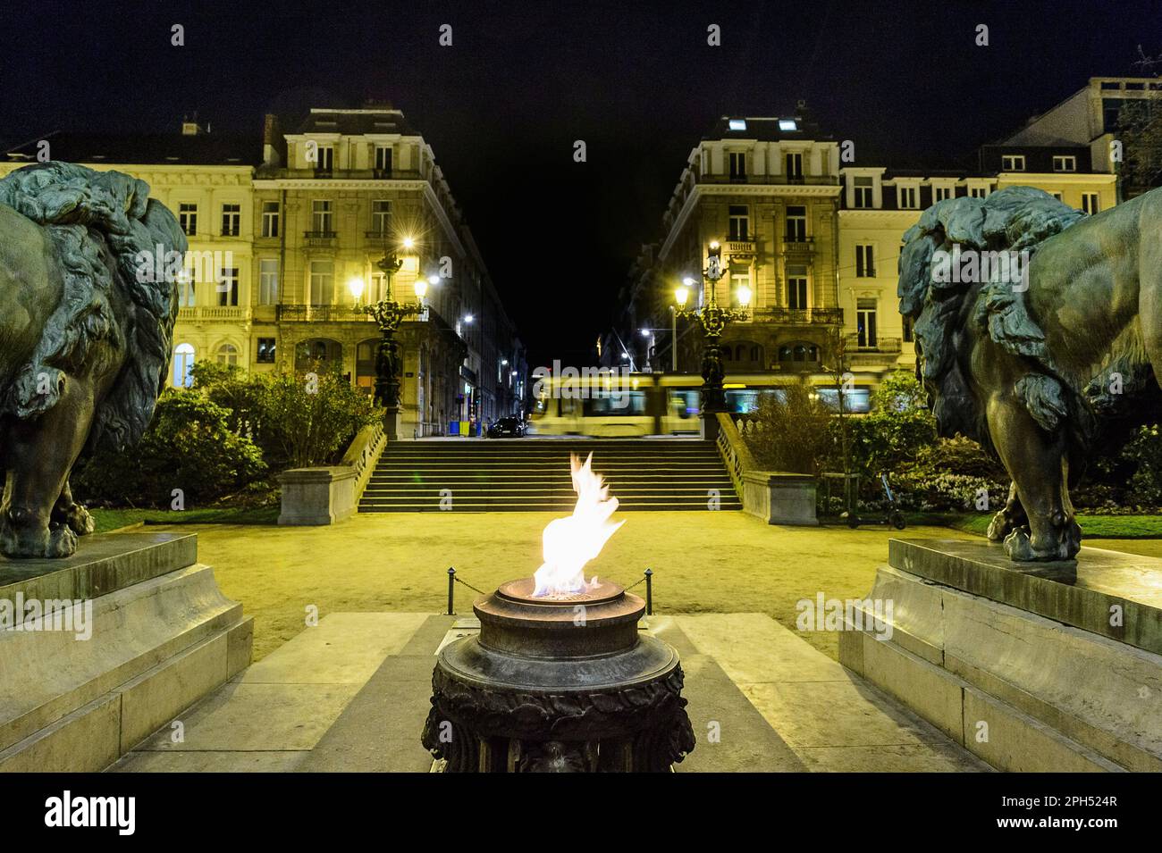 Brussels  - The eternal flame at the foot of the colums of the congress monument dominated by a statue of the  King Leopold I a commemorative flame fo Stock Photo