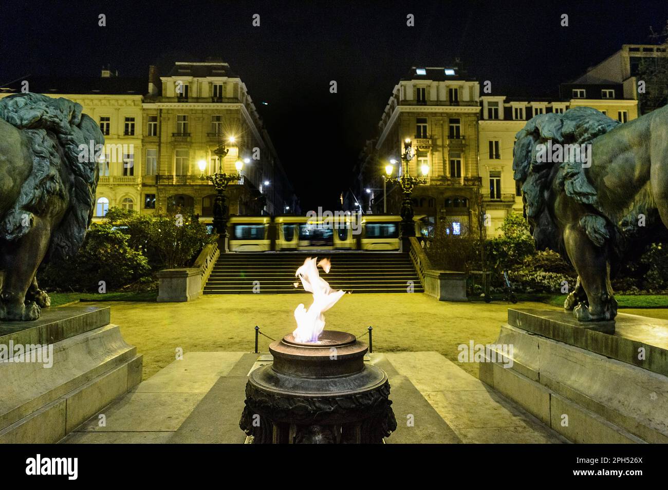 Brussels  - The eternal flame at the foot of the colums of the congress monument dominated by a statue of the  King Leopold I a commemorative flame fo Stock Photo