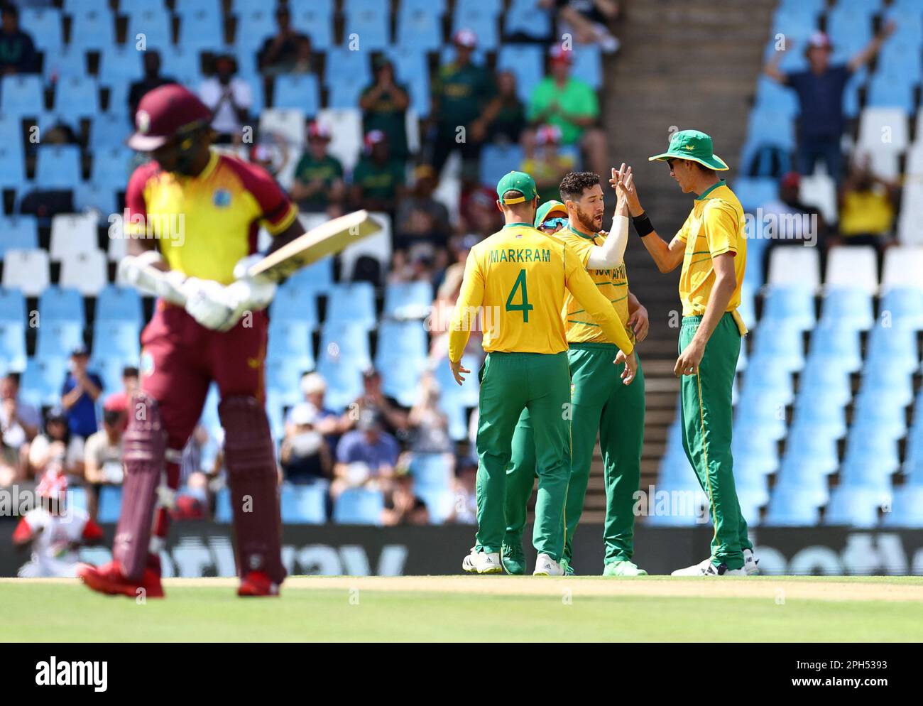 Cricket - Second Twenty20 - South Africa v West Indies - SuperSport Park Cricket Stadium, Centurion, South Africa - March 26, 2023  South Africa's Wayne Parnell celebrates with teammates after taking the wicket of West Indies' Brandon King REUTERS/Siphiwe Sibeko Stock Photo