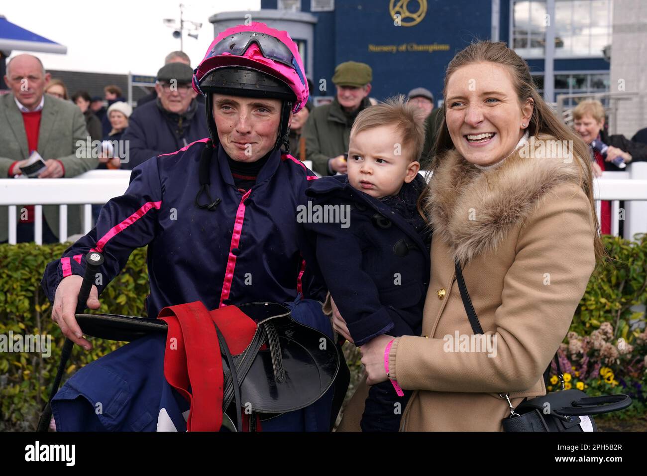 Winning owner Alana Insole and son Frederick with jockey Chris Hayes after winning the Compas Stallions Handicap with Magical Vision at Naas Racecourse, Ireland. Picture date: Sunday March 26, 2023. Stock Photo