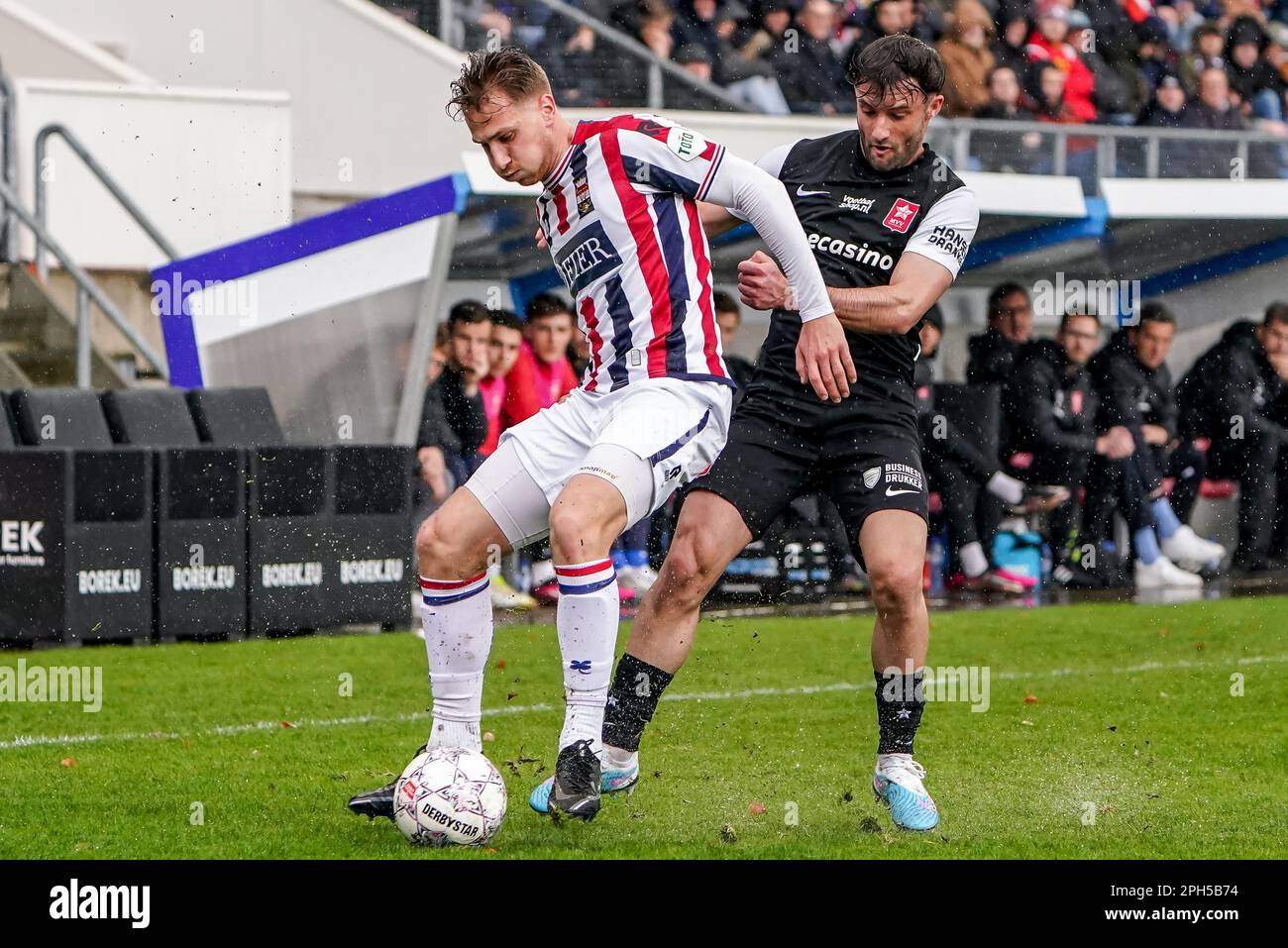 Tilburg, Netherlands. 26th Mar, 2023. TILBURG, NETHERLANDS - MARCH 26: Matthias Verreth of Willem II battles for the ball with Mart Remans of MVV during the Keuken Kampioen Divisie match between Willem II and MVV Maastricht at Koning Willem II Stadion on March 26, 2023 in Tilburg, Netherlands (Photo by Joris Verwijst/ Orange Pictures) Credit: Orange Pics BV/Alamy Live News Stock Photo