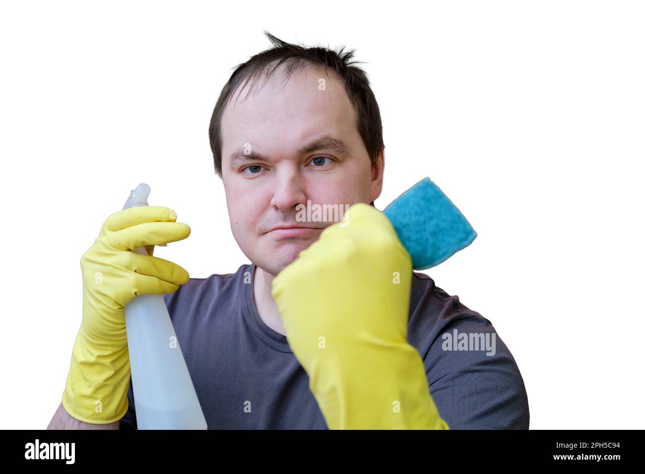 Angry male cleaner in yellow gloves, studio isolated on a white background Stock Photo