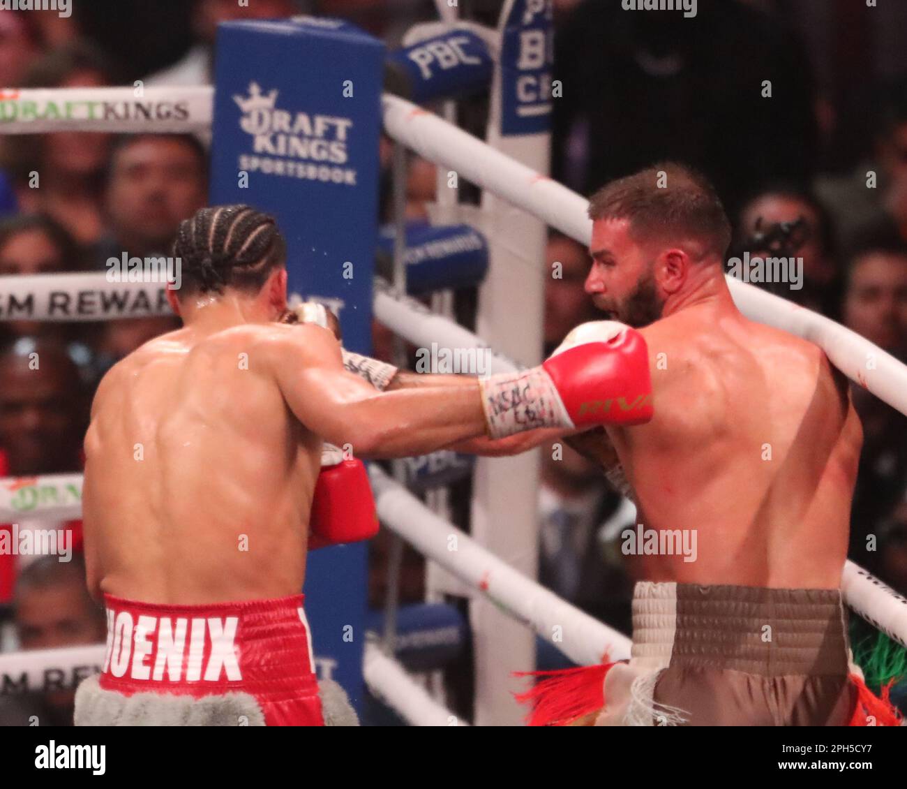 LAS VEGAS, NV - MARCH 25: (R-L) Caleb Plant punches David Benavidez in their Interim WBC World Super Middleweight Title bout at the MGM Grand Garden Arena on March 25, 2023 in Las Vegas, NV, United States. (Photo by Alejandro Salazar/PxImages) Stock Photo