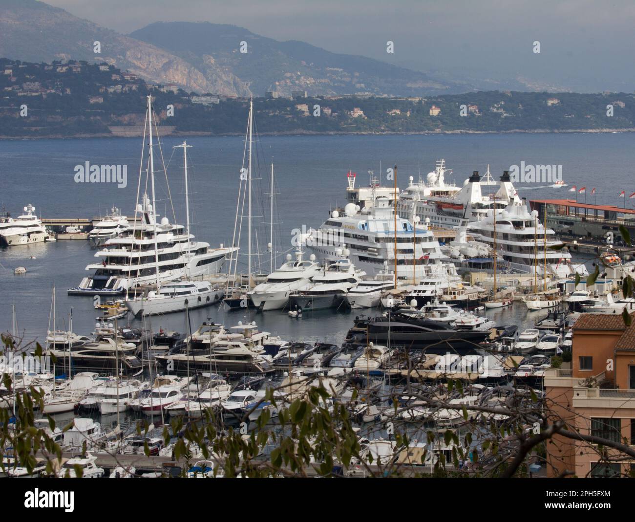 Some of the many super yachts moored in the harbour at Monaco, Monte Carlo. Stock Photo