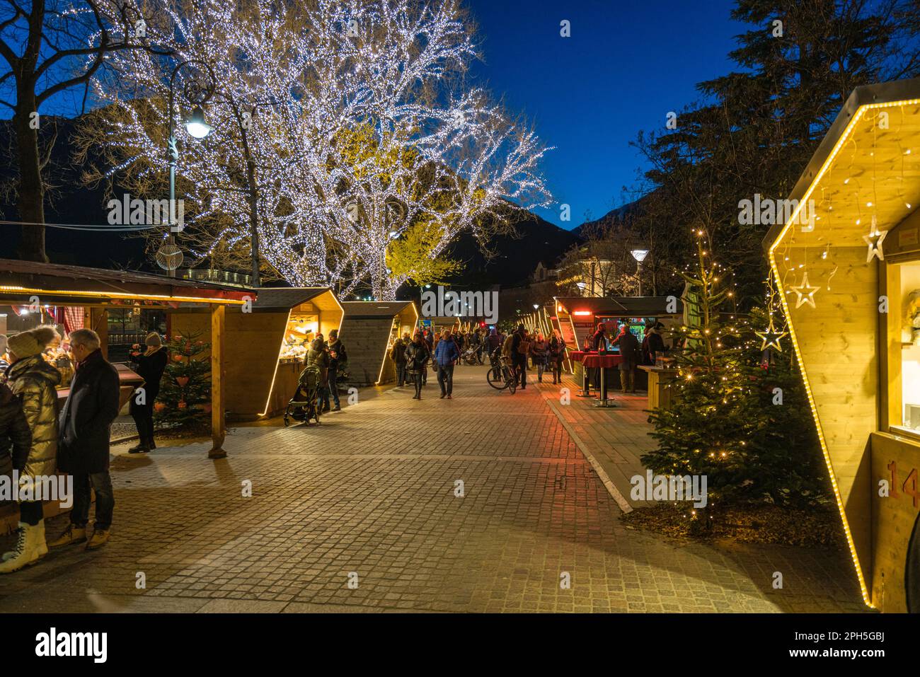 The beautiful city of Merano in the evening during Christmas time, Trentino Alto Adige, northern Italy. December-16-2022 Stock Photo