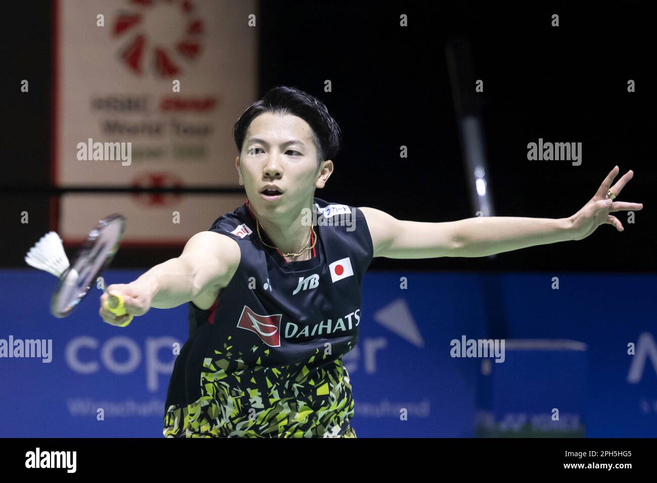 Japans Koki Watanabe returns a shuttlecock to Chinese Taipeis Tien Chen Cho during their mens final match at the Badminton Swiss Open in the St