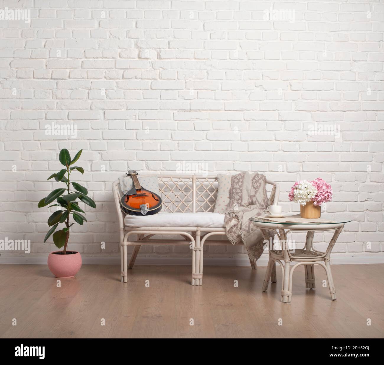 Country style Rattan Living Room Loveseat on white brick wall ...