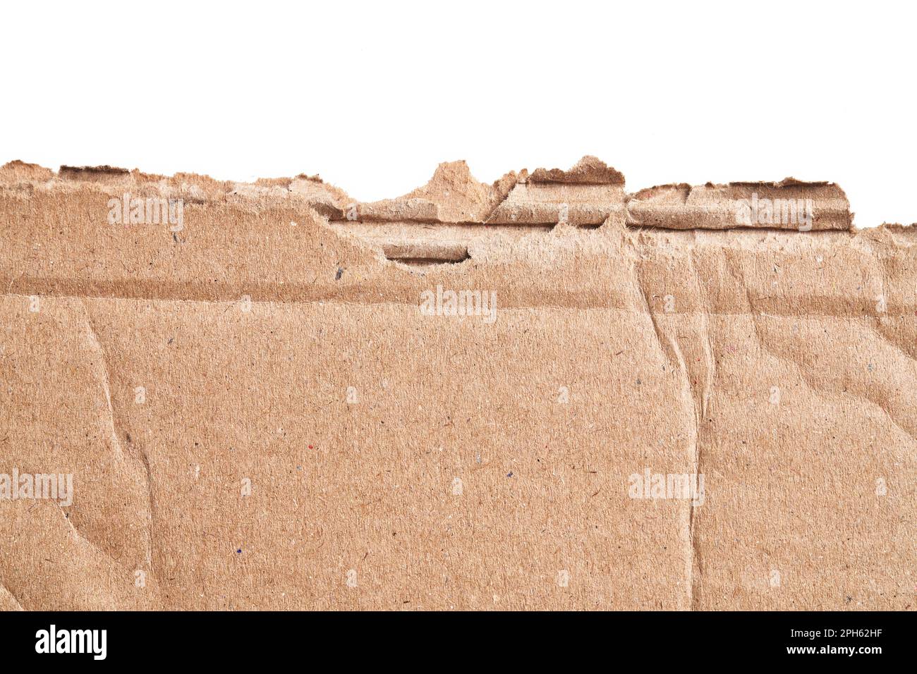 One ripped piece of cardboard material over isolated white background ...