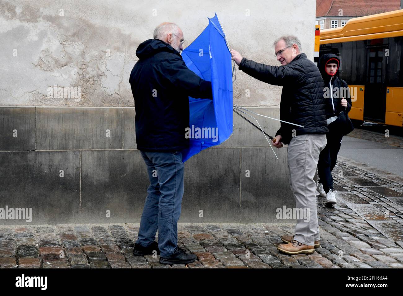 Copenhagen /Denmark/26 March 2023/People use umbrella duering rain fall