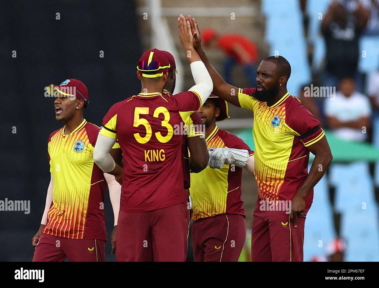 Cricket - Second Twenty20 - South Africa v West Indies - SuperSport Park Cricket Stadium, Centurion, South Africa - March 26, 2023  West Indies' Raymon Reifer celebrates with teammates after taking the wicket of South Africa's Quinton de Kock REUTERS/Siphiwe Sibeko Stock Photo