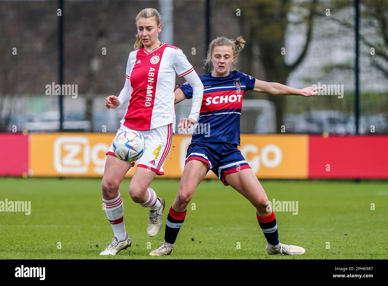 Amsterdam, Netherlands. 26th Mar, 2023. AMSTERDAM, NETHERLANDS - MARCH 26: Lisa Doorn of Ajax battles for the ball with Veerle Van Der Most of VV Alkmaar during the Azerion Eredivisie Vrouwen match between Ajax and vv Alkmaar at Sportcomplex De Toekomst on March 26, 2023 in Amsterdam, Netherlands (Photo by Jeroen Meuwsen/Orange Pictures) Credit: Orange Pics BV/Alamy Live News Stock Photo