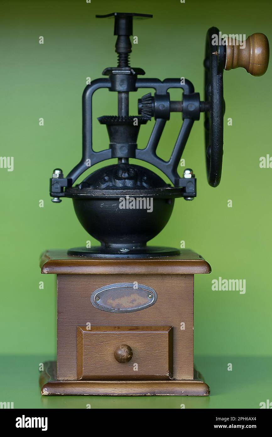 Portable hand coffee grinder is located on the floor Stock Photo Alamy