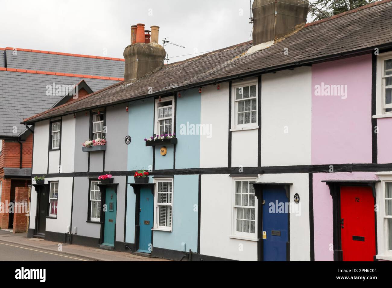 The colourful Woodfield Lane cottages in Ashtead, Surrey, England, UK