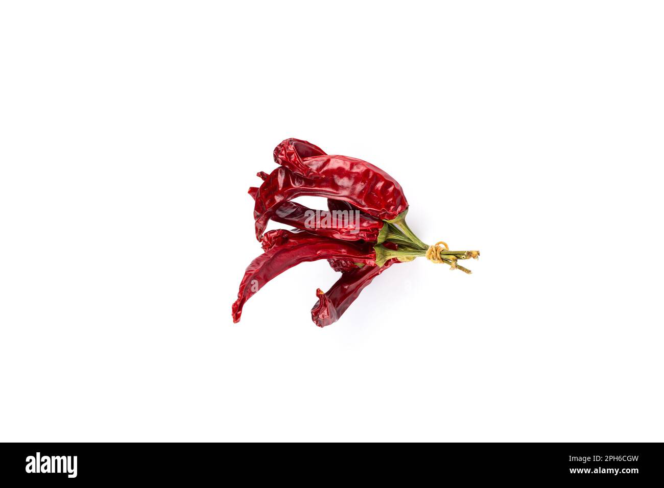 Dried red chili peppers isolated on white background Stock Photo - Alamy