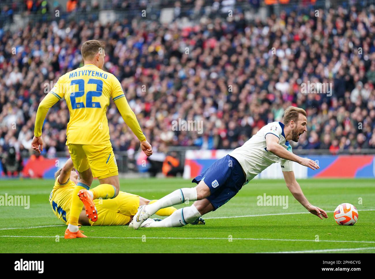 England's Harry Kane bought down in the penalty area by Ukraine's ...