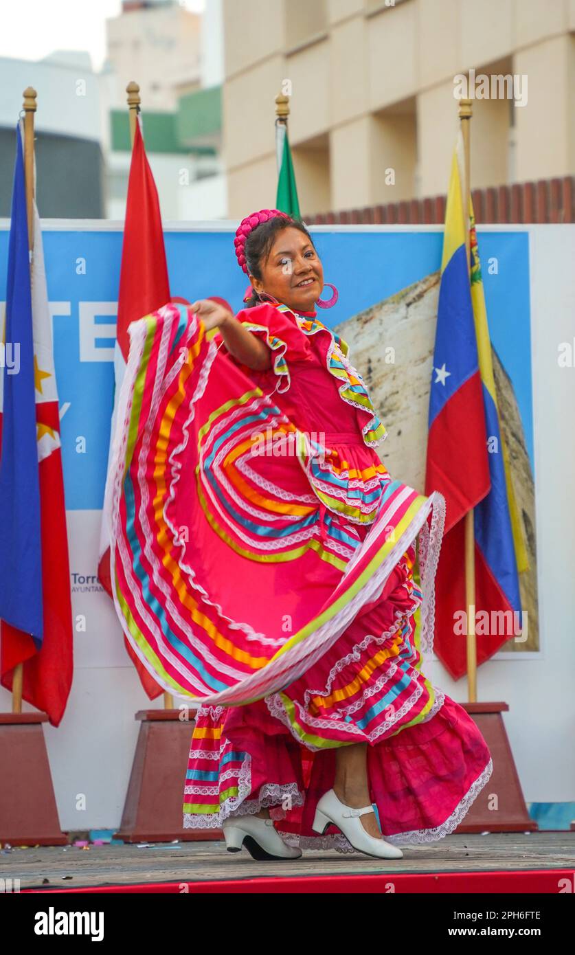 Torremolinos. Woman performing traditional South American dance, dia del residente, multicultural event, Costa del Sol, Spain. Stock Photo
