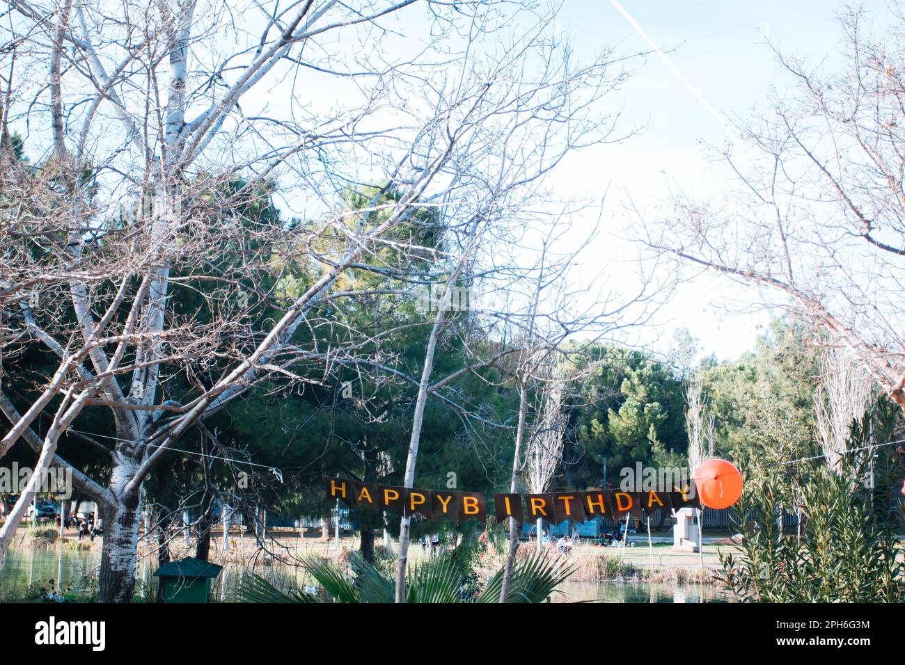 Inscription happy birthday in the park Stock Photo - Alamy