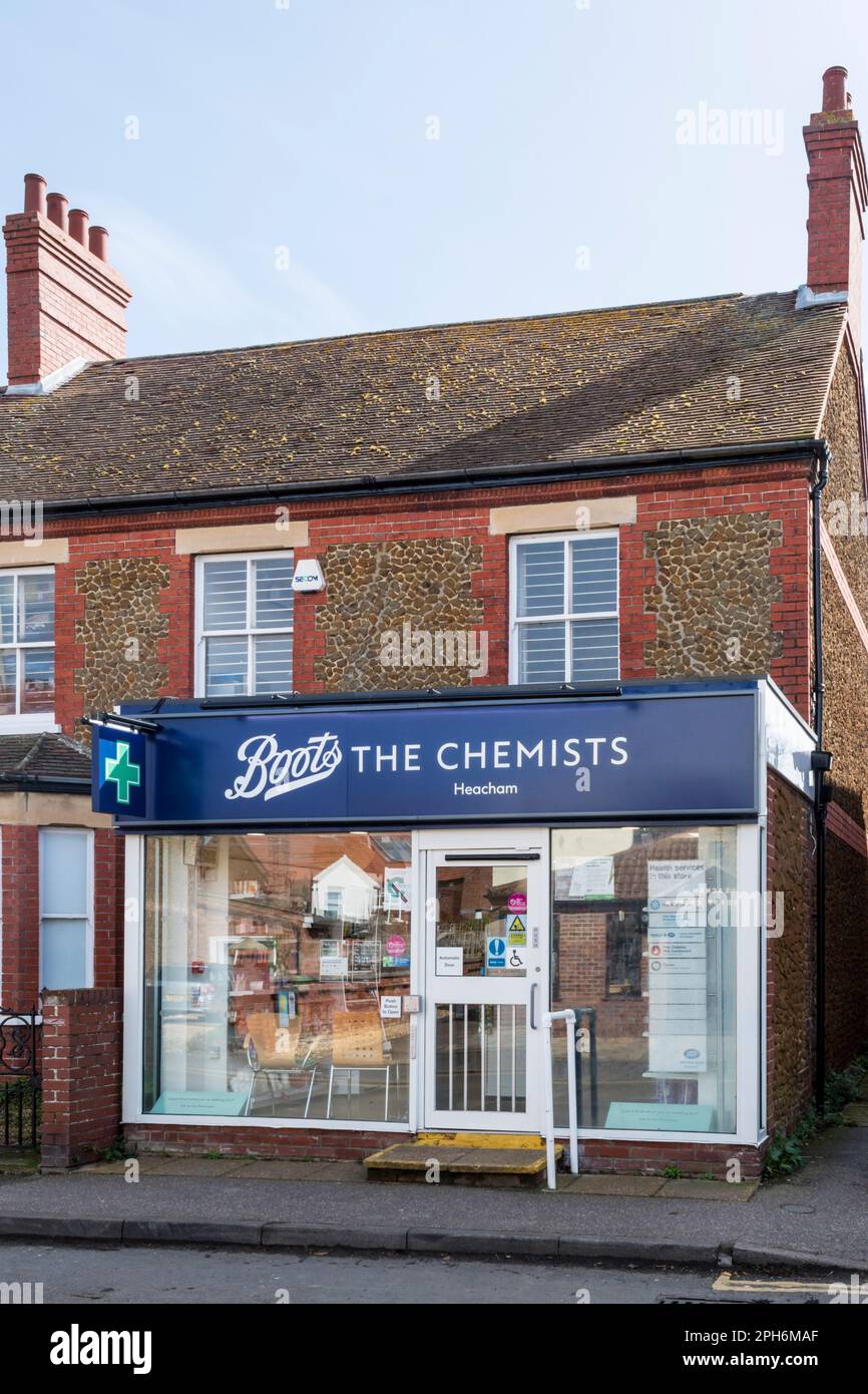 A small branch of Boots the chemists in the Norfolk village of Heacham. Stock Photo