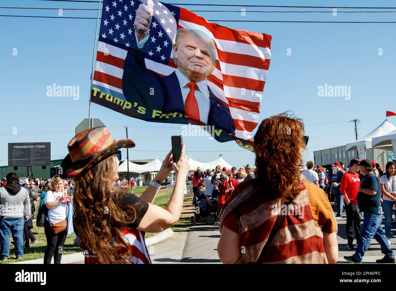 Waco, Texas, USA. 24th Mar, 2023. Donald Trump supporters snap pictures