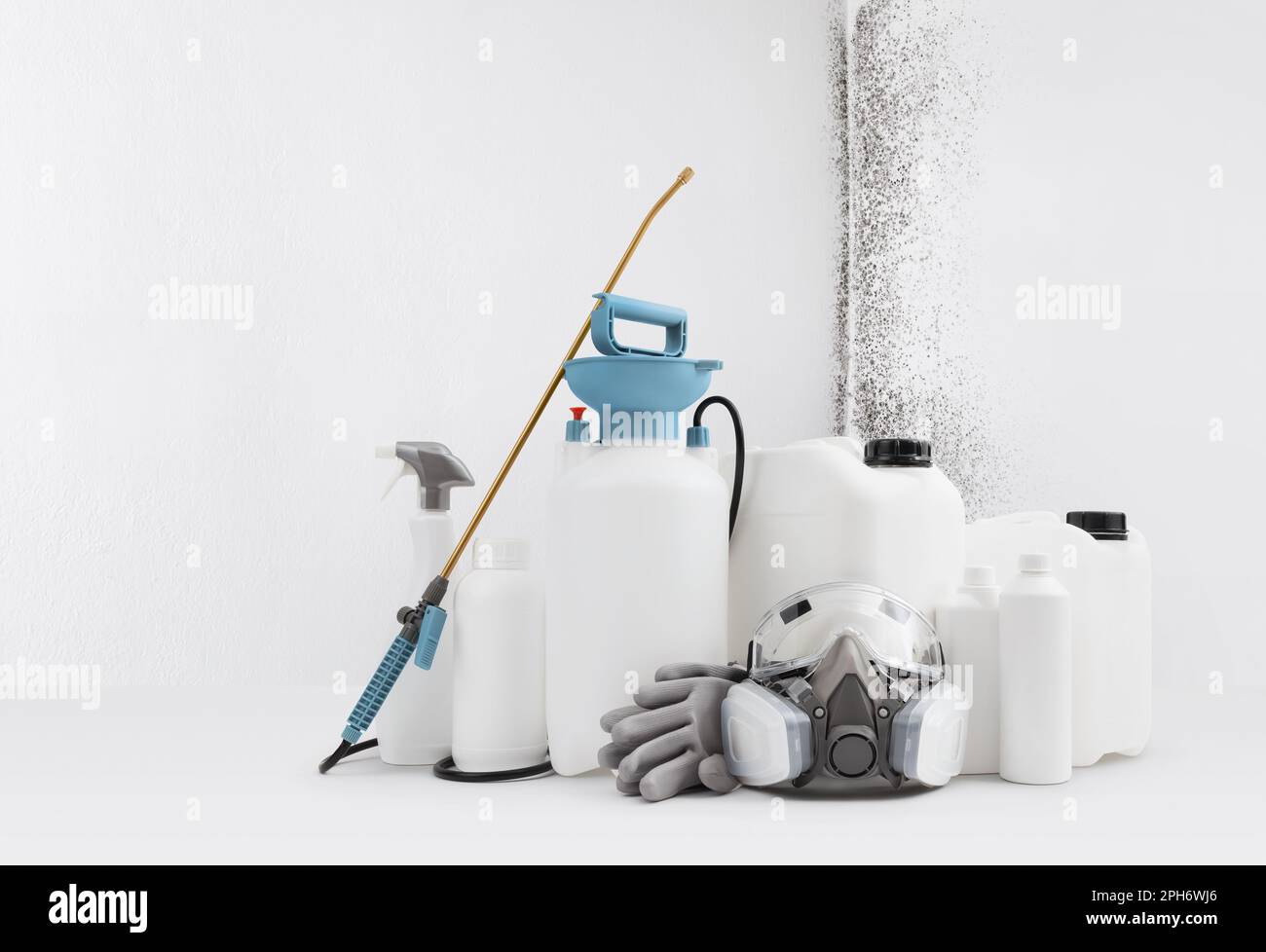 Cleaning and disinfection tools kit, isolated on white wall with mold  background. Protective respirator mask, manual pump nebulizer and jerry can  to d Stock Photo - Alamy