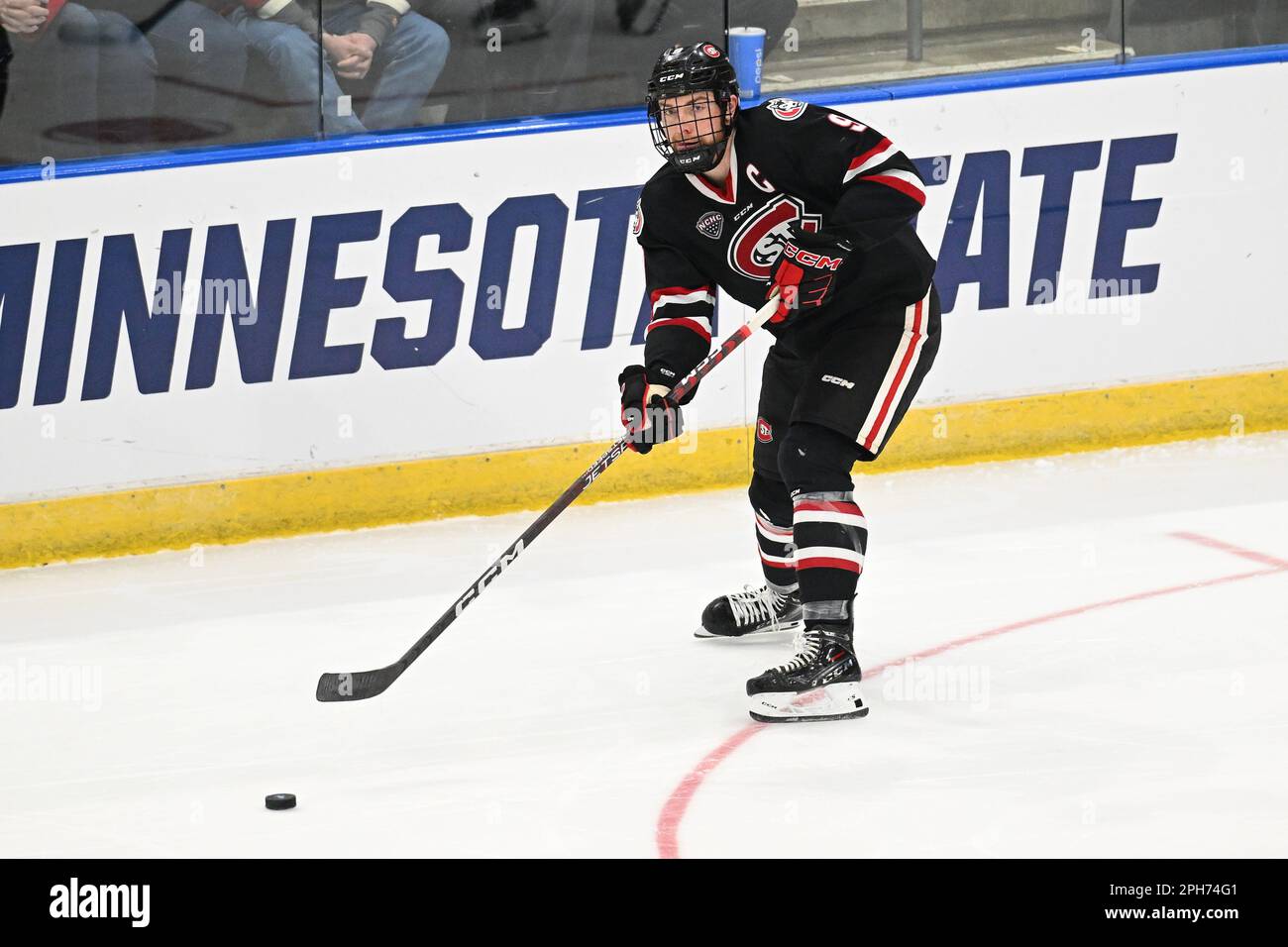 St. Cloud State Huskies defenseman Spencer Meier (9) passes the puck during the championship