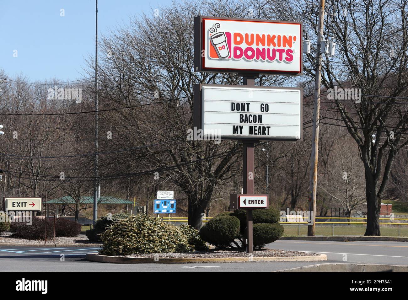 A sign with the Dunkin' Donuts logo is seen at its restaurant along