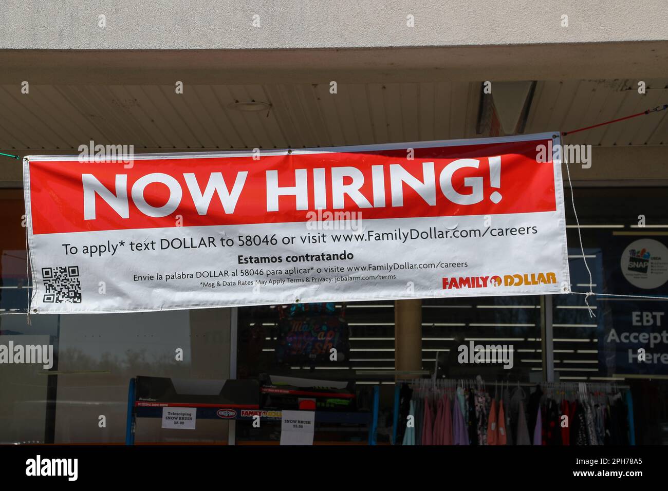 A now hiring sign is seen at the Family Dollar store at the Sunbury