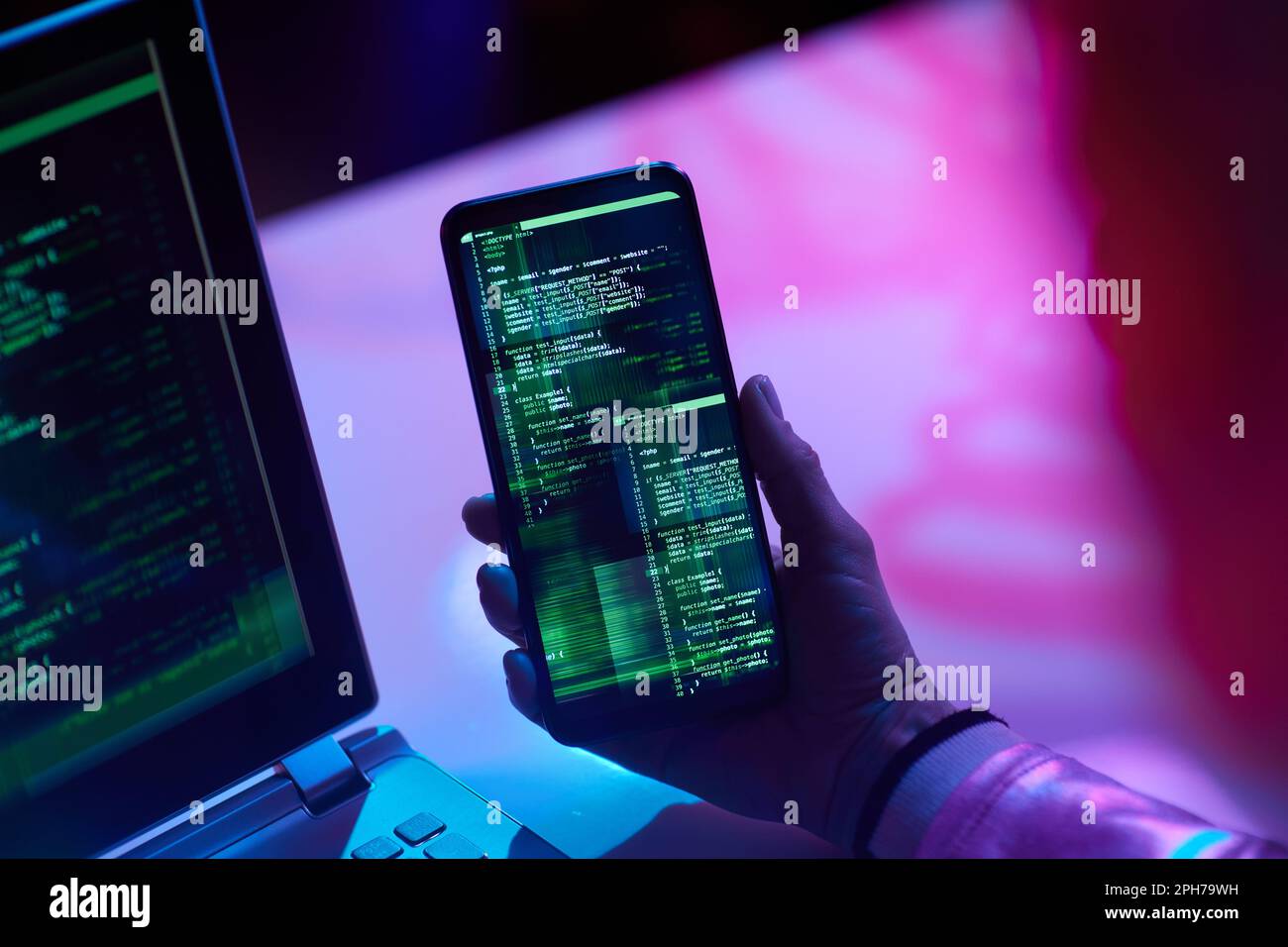 Closeup on modern female with smartphone developing video game. Stock Photo
