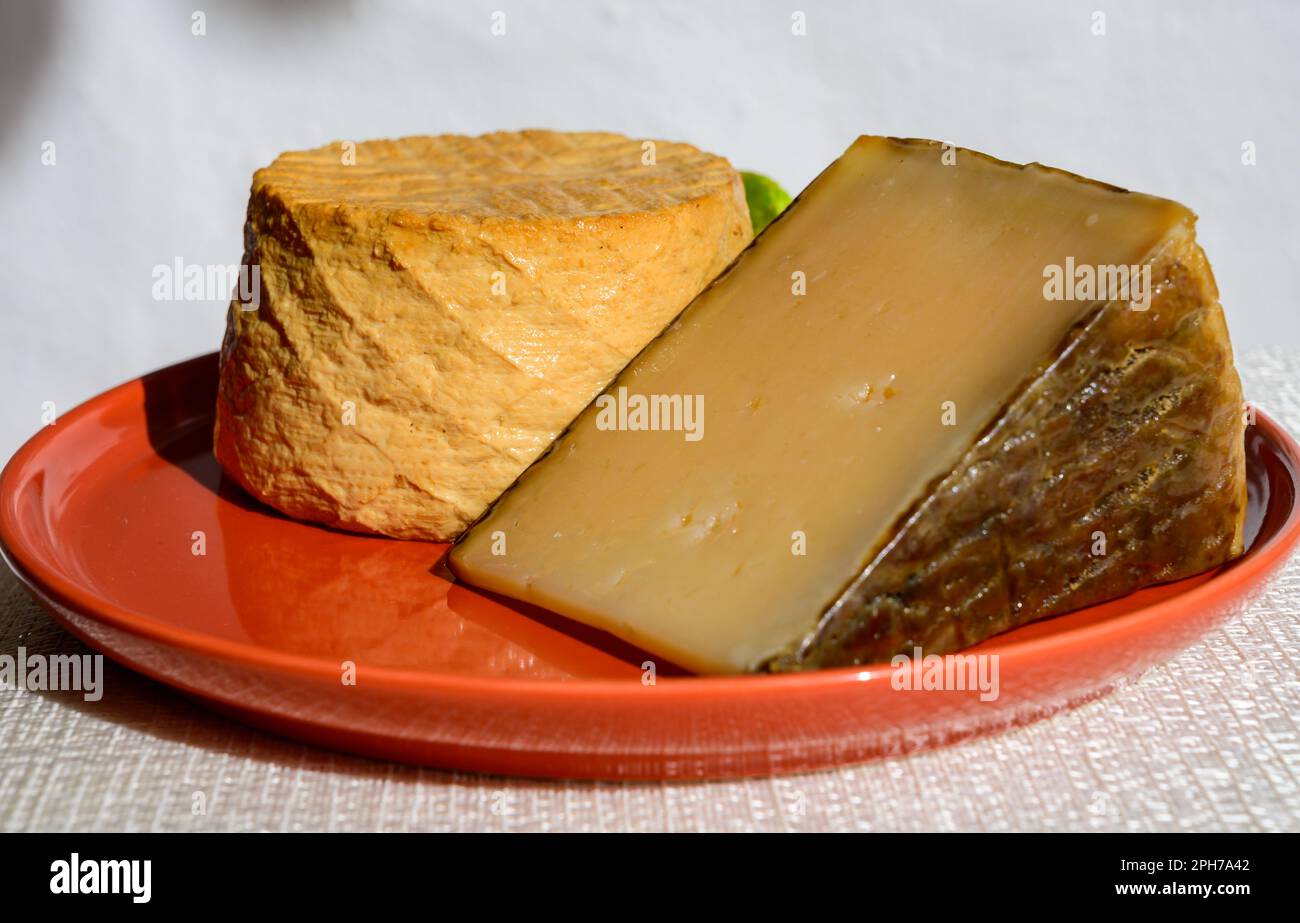 Spanish cheeses collection, pieces of smoked and old matured goat