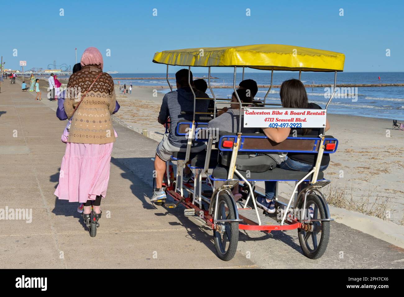 Galveston, Texas, USA February 2023 People on an electric scooter