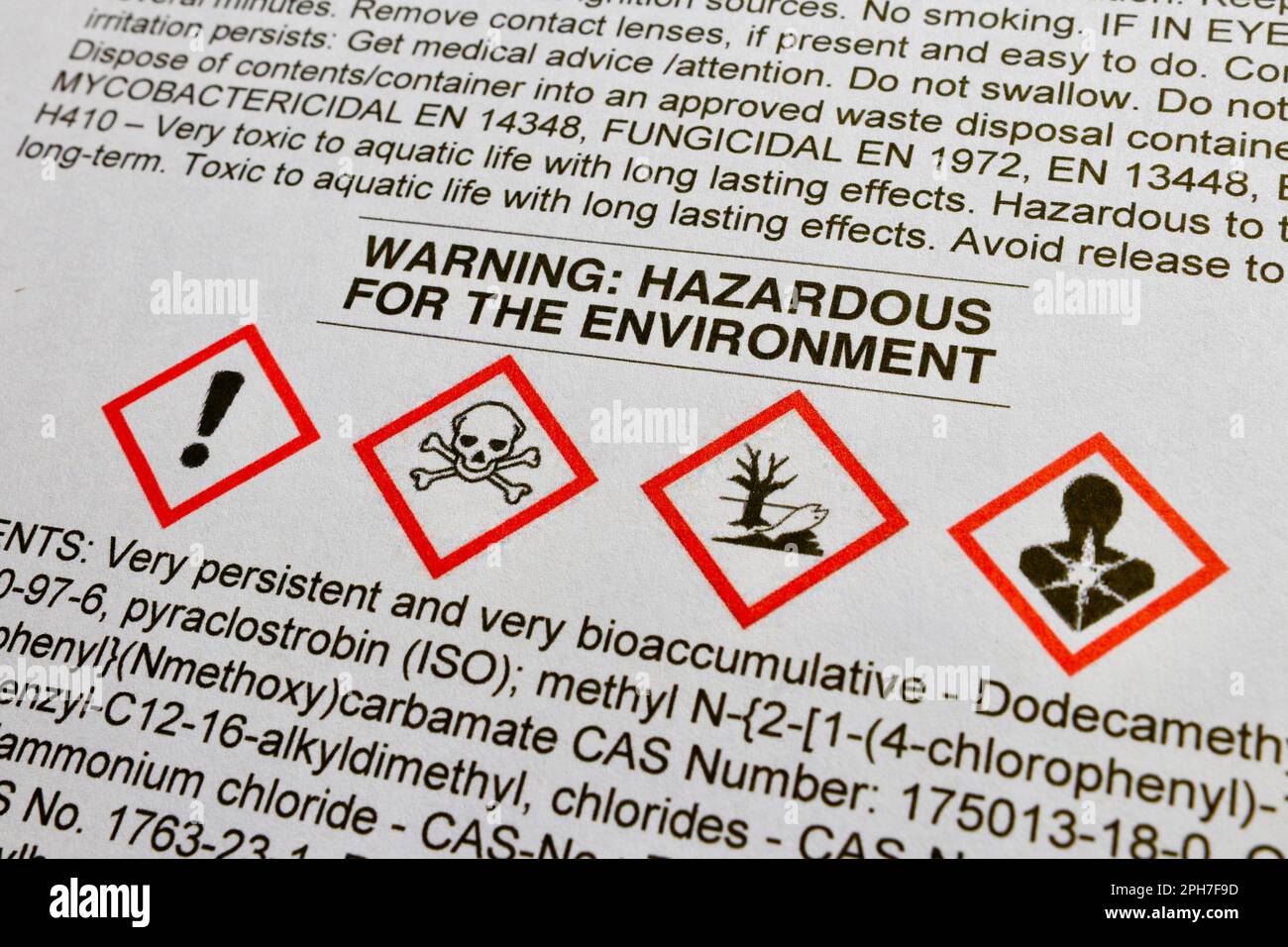 Warning on a Safety Data Sheet indicating that the product contains substances hazardous to the environment. Standard chemical hazard pictograms shown Stock Photo