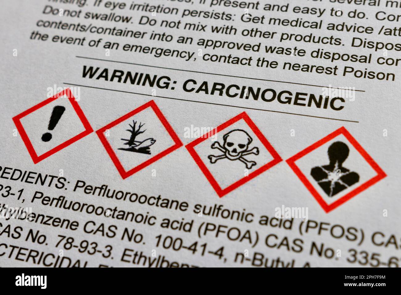 Warning on a Safety Data Sheet indicating that the product contains carcinogenic substances. Standard chemical hazard pictograms are shown Stock Photo