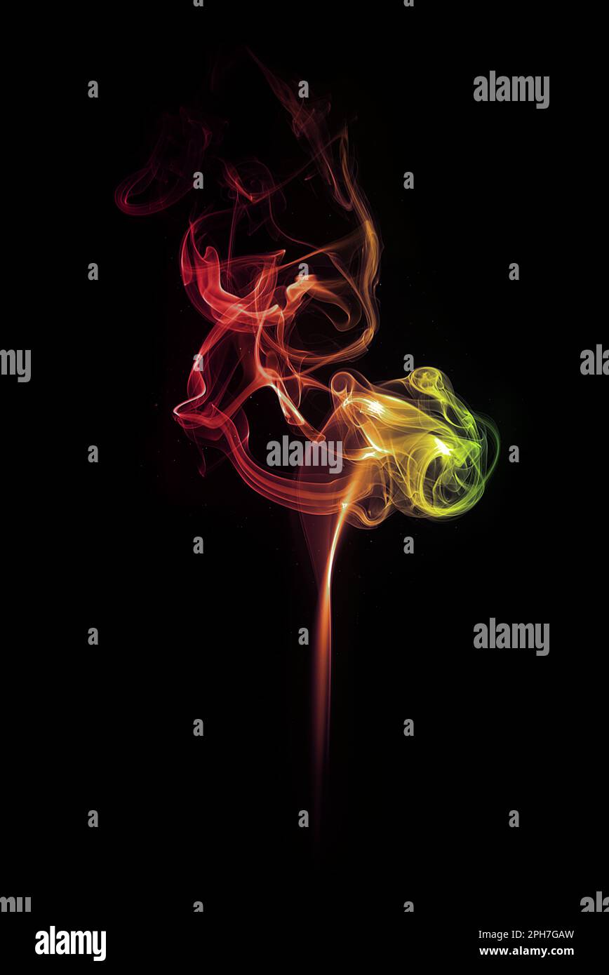 swirl of red and yellow smoke isolated on black Stock Photo - Alamy