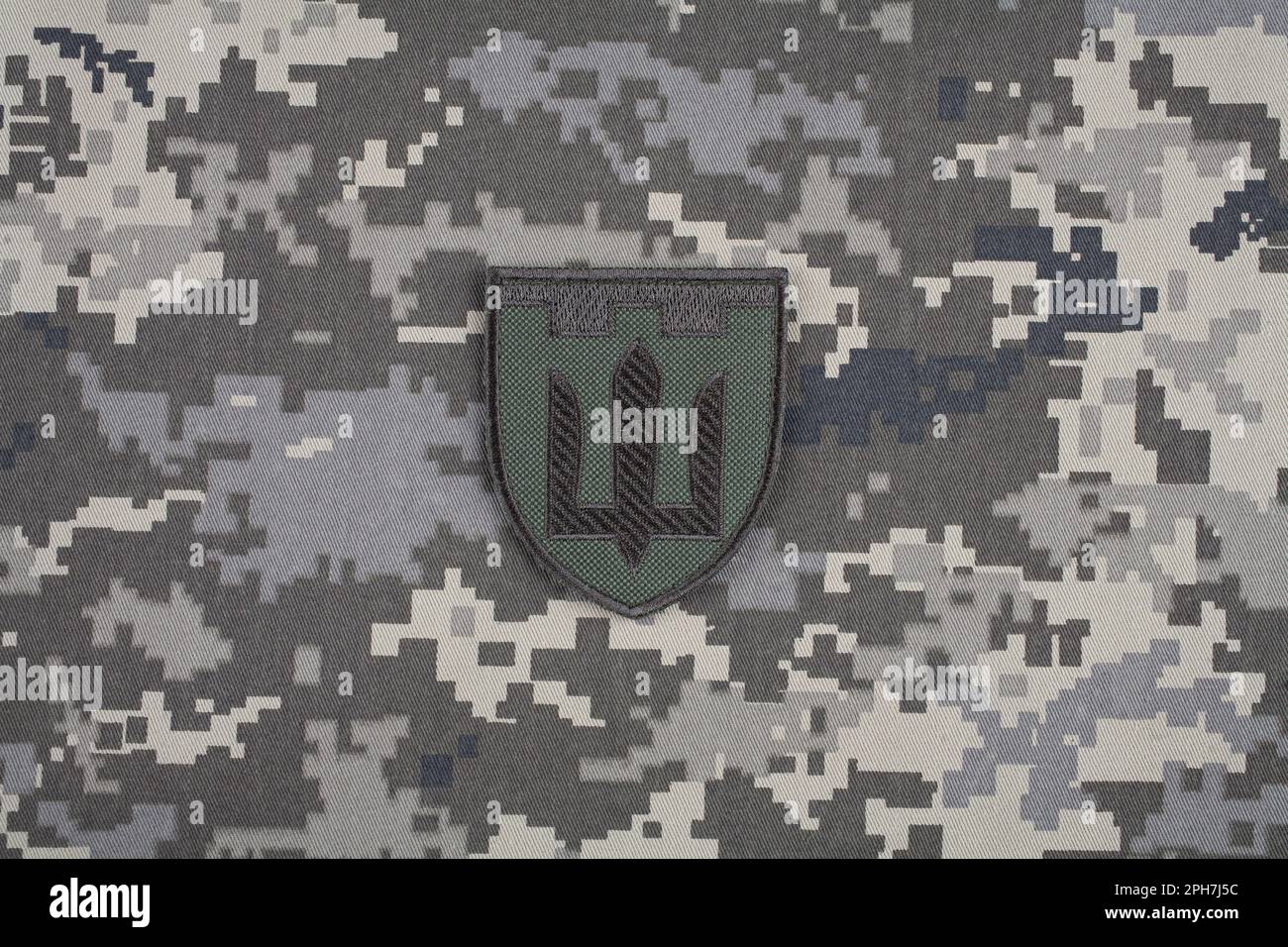 KYIV, UKRAINE - October 6, 2022. Russian invasion in Ukraine 2022. Territorial Defence Forces of Ukraine uniform insignia badge on camouflaged uniform Stock Photo