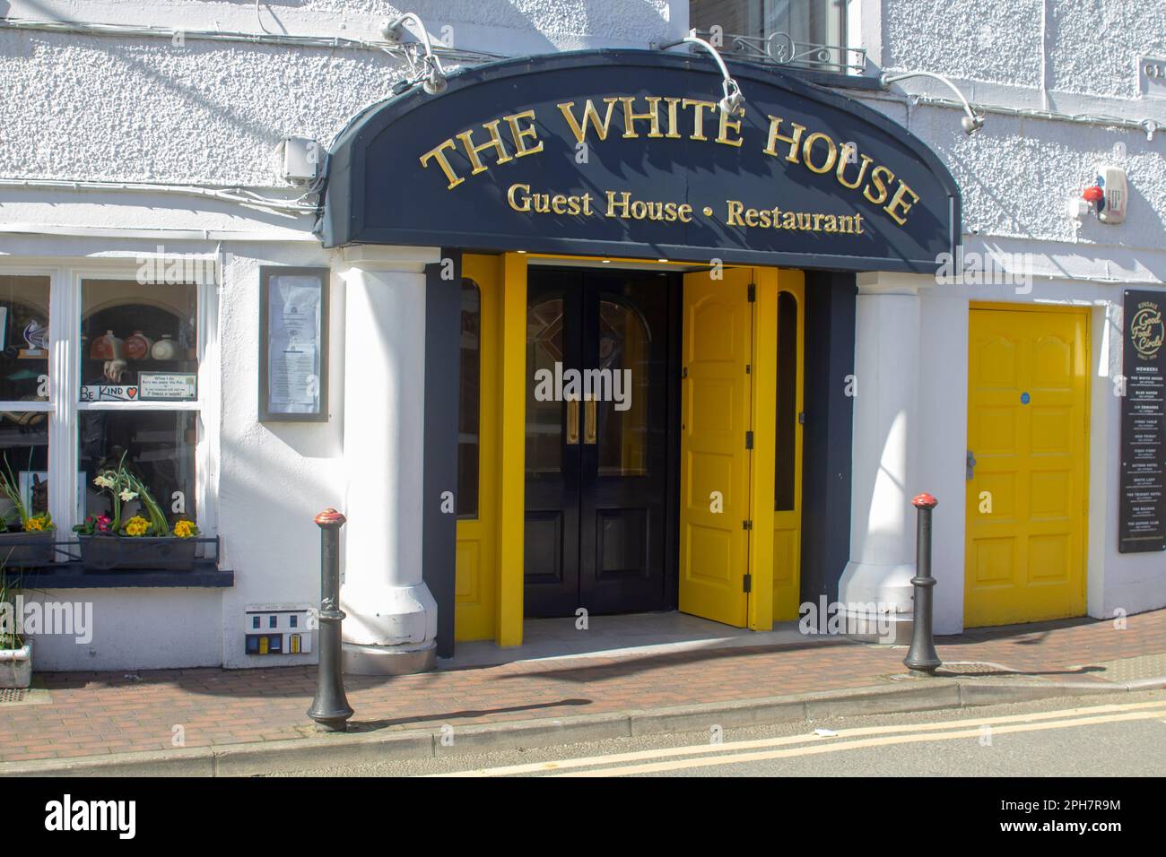 18 March 2023, The entrance to the White House a typical Irish restaurant on The Glen a narrow street in the town of Kinsale in County Cork Irelandm Stock Photo