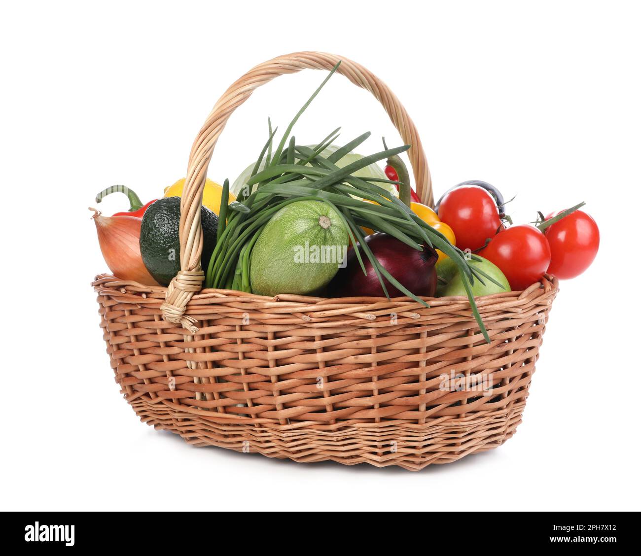 Fresh ripe vegetables and fruits in wicker basket on white background ...