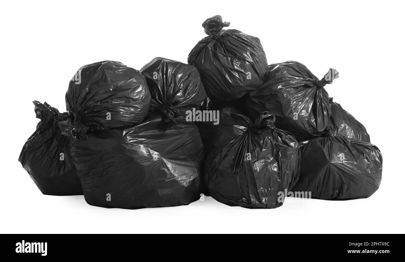 Black trash bags full of garbage on white background Stock Photo Alamy