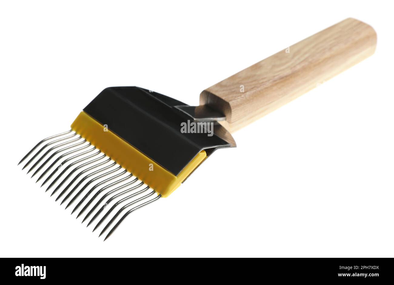 Uncapping fork isolated on white. Beekeeping tool Stock Photo