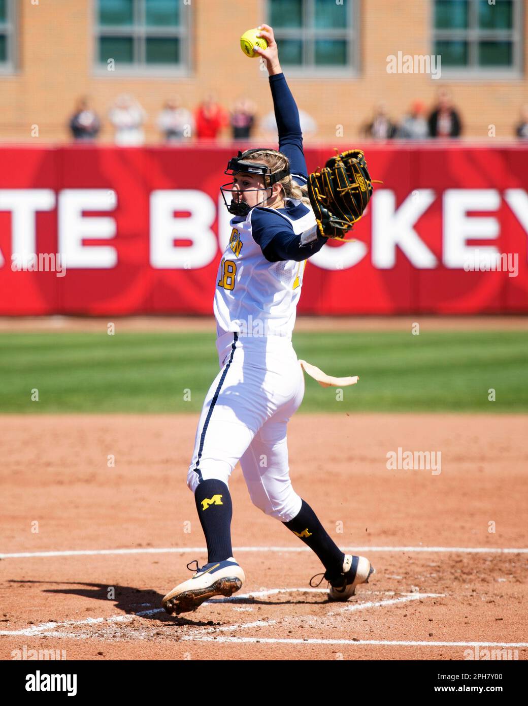 Columbus, Ohio, USA. 26th Mar, 2023. Michigan Wolverines pitcher Lauren Derkowski (18) pitches against the Ohio State Buckeyes in their game in Columbus, Ohio. Brent Clark/CSM/Alamy Live News Stock Photo