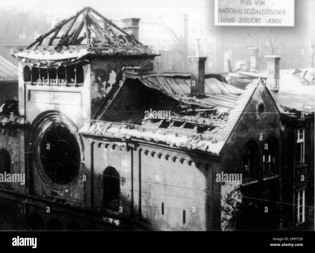 The Ruined Ohel Yaakov synagogue in Munich. Kristallnacht was a nationwide pogrom that was organised and carried out by the nazi Party on the 9th November 1938. Shops and synagogues were destroyed and people humiliated and beaten while the police looked on, or even helped. Though the amount of damage and the number of people attacked was quite small, the fact that it was completely unopposed showed the Nazis that they could really start in on the Jews and, as such, is one of the major milestones on the way to The Holocaust. https://commons.wiki Stock Photo