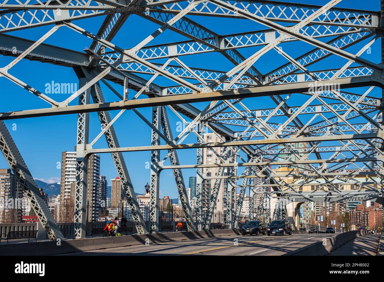 Structure of a bridge with the blue sky background. Burrard Street Bridge, Vancouver Coast, British Columbia, Canada-March 22,2023-Travel photo, stree Stock Photo