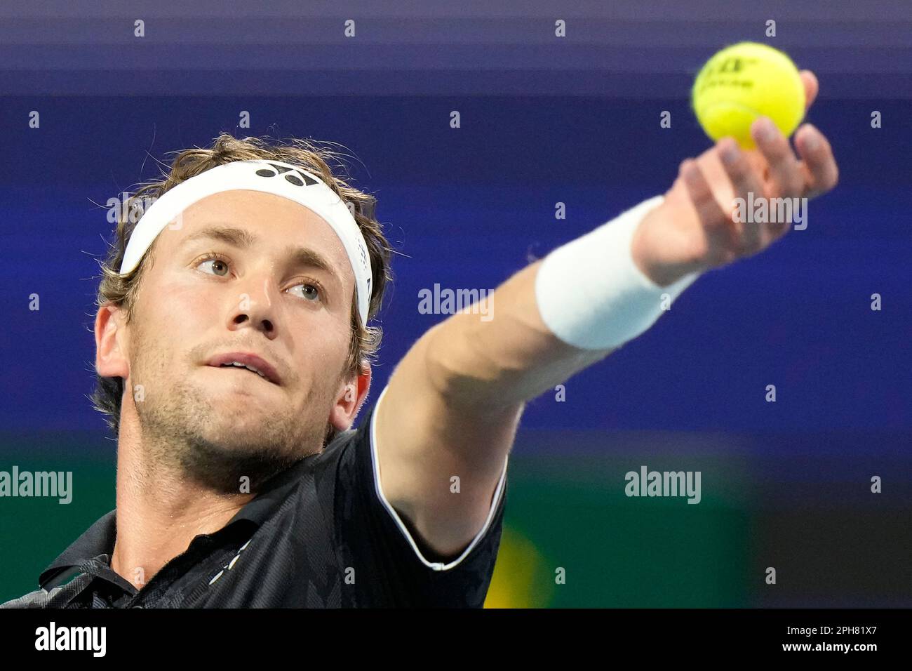 Casper Ruud, of Norway, serves to Botic van de Zandschulp, of the Netherlands, during the Miami