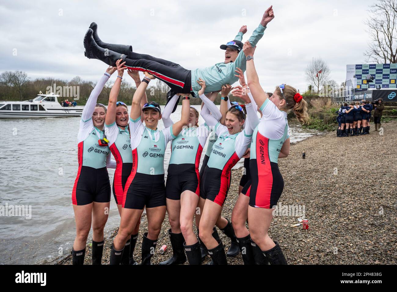 London, Britain. 26th Mar, 2023. Members of the Cambridge crew raise their cox James Trotman as they celebrate the winning of the women's boat race between Oxford University and Cambridge University in London, Britain, March 26, 2023. Credit: Stephen Chung/Xinhua/Alamy Live News Stock Photo