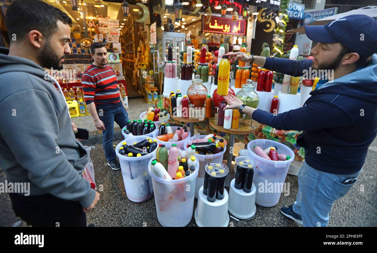 Beirut, Lebanon. 26th Mar, 2023. A juice seller promotes his products in Beirut, Lebanon, on March 26, 2023. Credit: Bilal Jawich/Xinhua/Alamy Live News Stock Photo