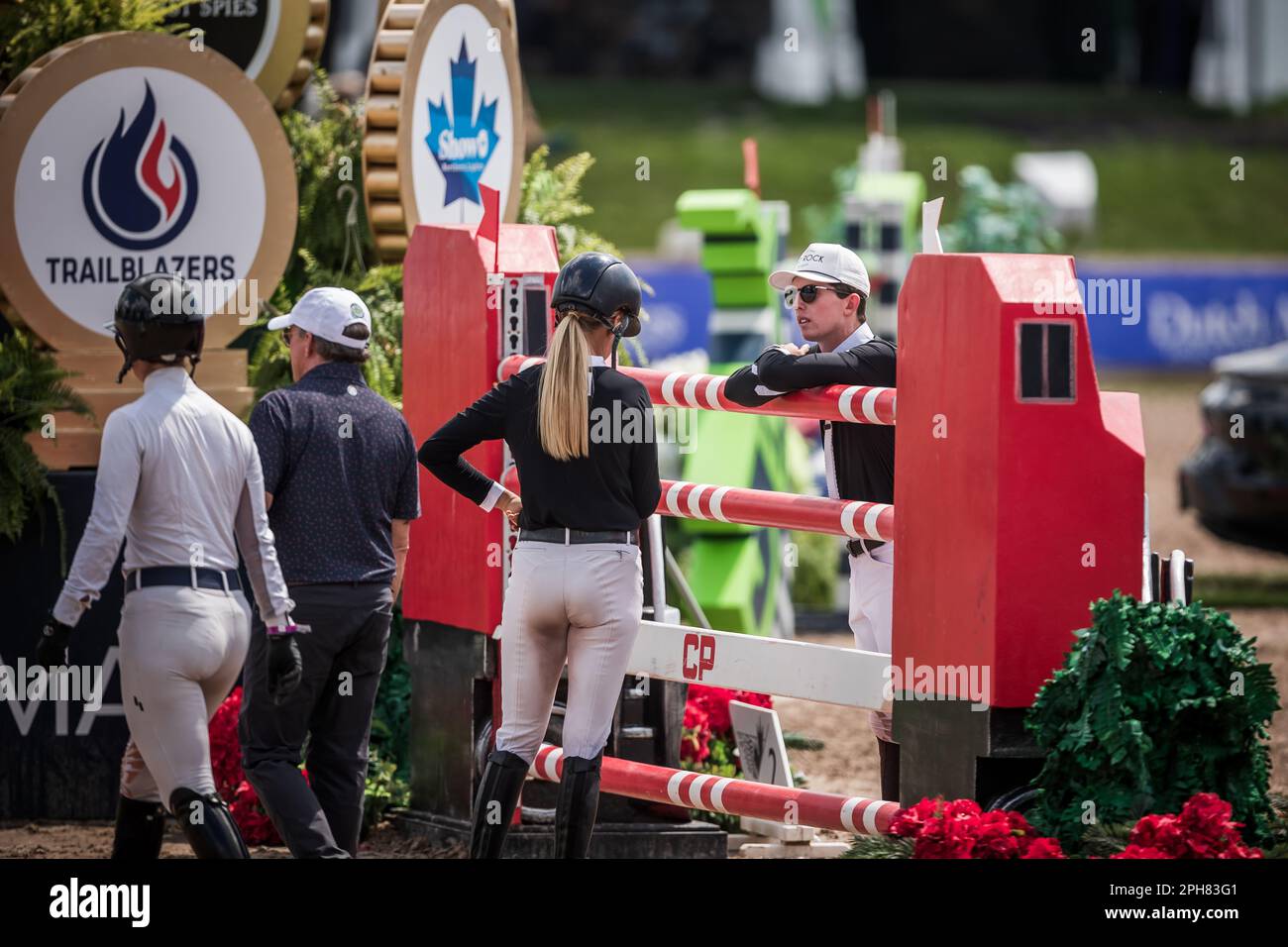 Walk In Rider USA rider Kristen VanderVeen, left, chats with Canadian rider, Sam ...