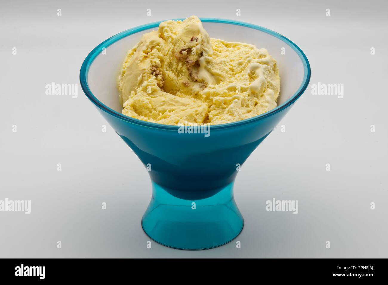 Blue bowl of Italian Vanilla Bourbon ice cream. Stock Photo