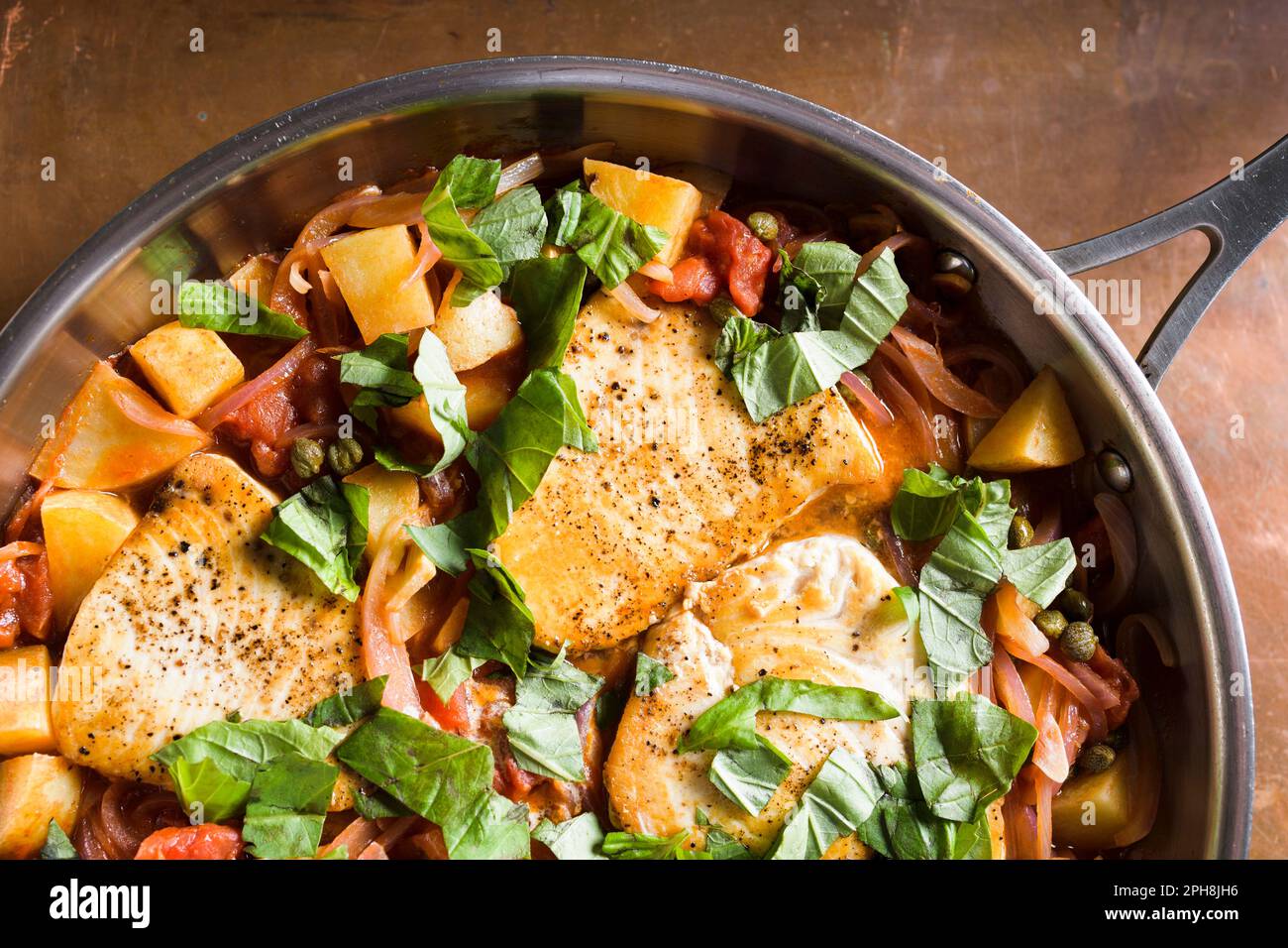 This image released by Milk Street shows a recipe for swordfish with