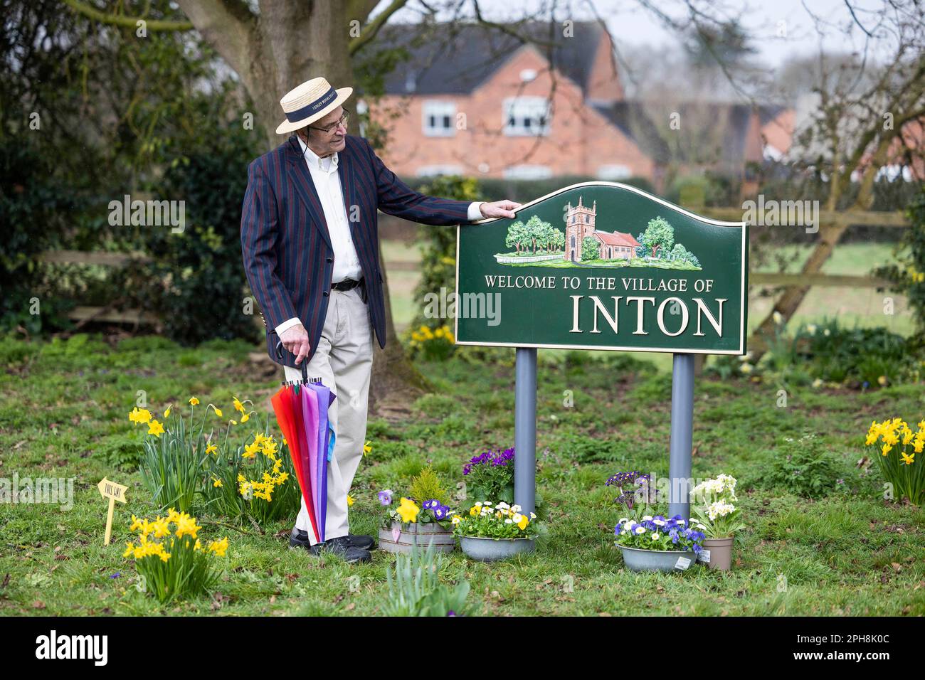 EDITORIAL USE ONLY Local Chris Marples looks at a sign where the 'egg' is missing in Egginton, Derbyshire where the word 'egg' has been removed from various signs around the village as part of the return of 'Cadbury Worldwide Hide', a virtual Easter egg hide where people can hide an Easter egg anywhere in the world for a loved one to find. Issue date: Monday March 27, 2023. Stock Photo