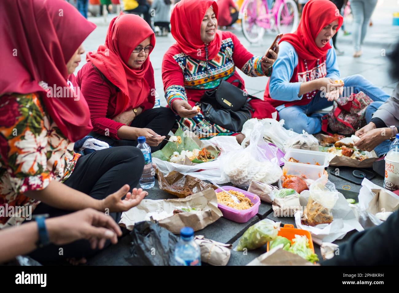 Family picnic at Kota Tua, Jakarta Stock Photo