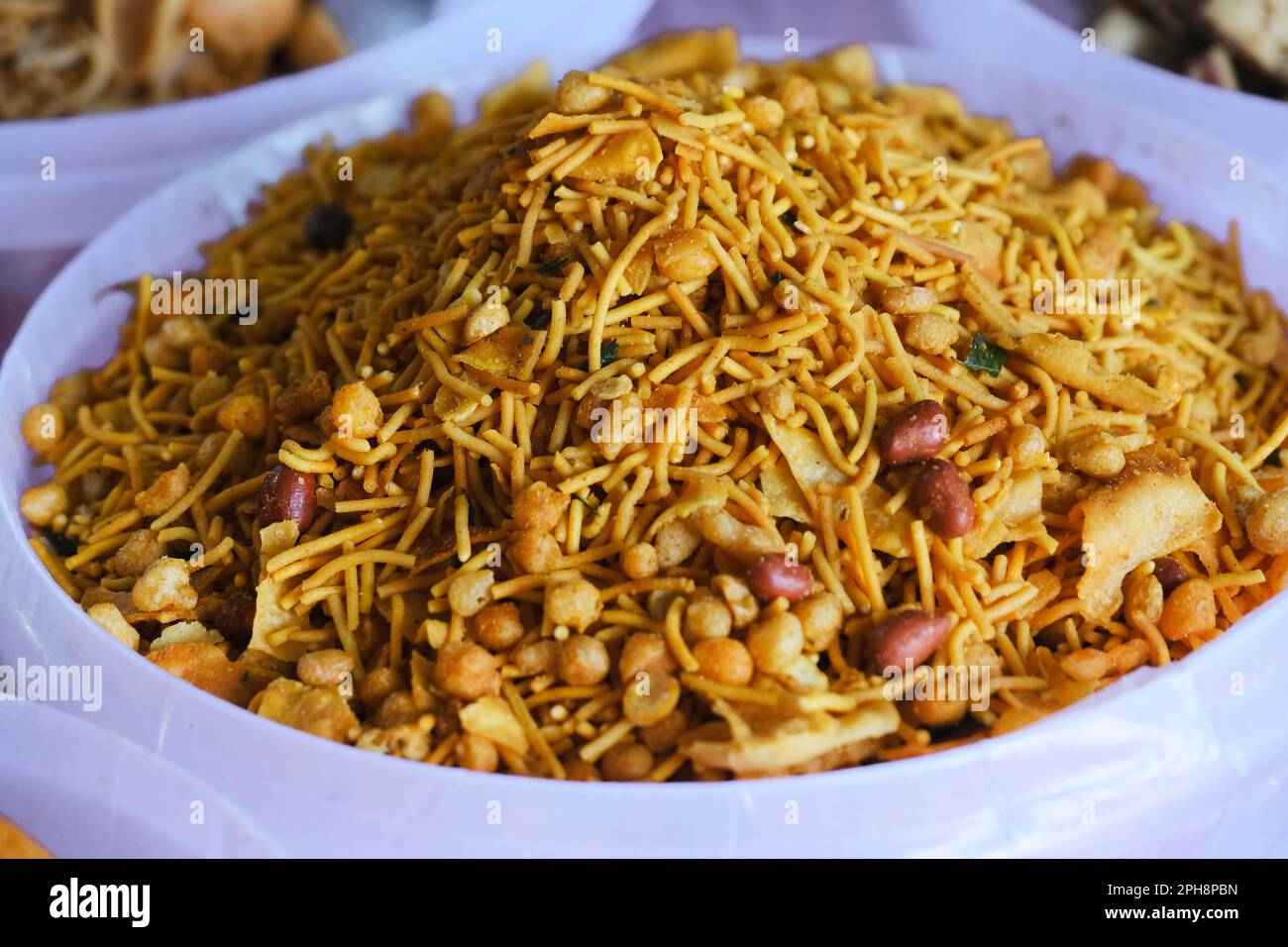 Farsan, snacks in bowls for sale in Indian Market, Traditional Indian
